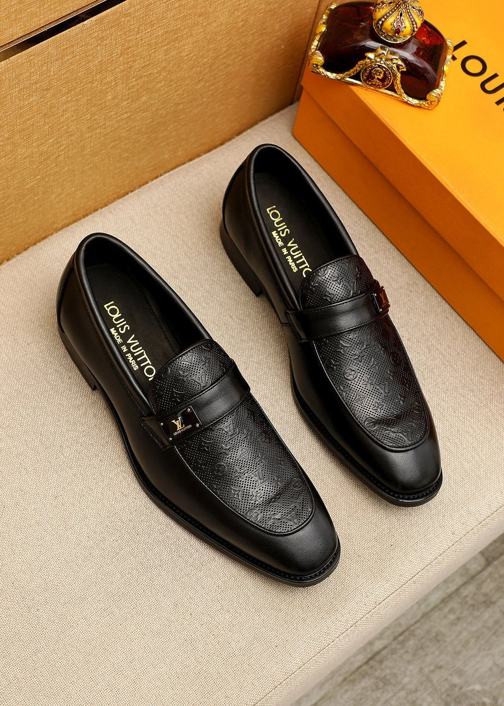 Louis Vuitton Men's Black Embossed Loafers - Rounded Toe